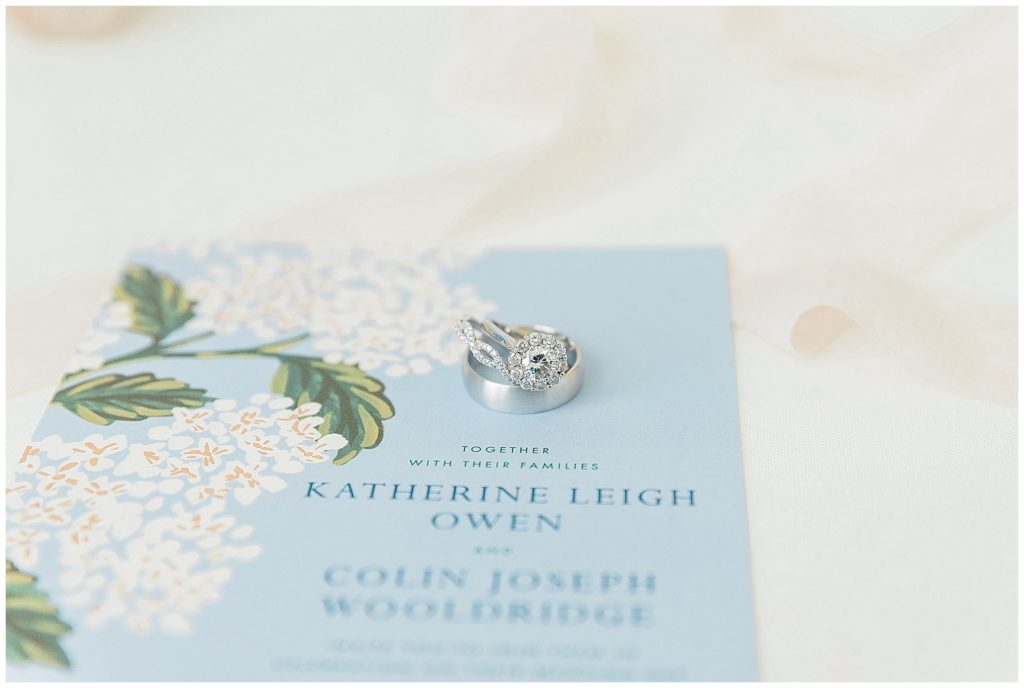 hydrangea wedding invitation with halo set diamond engagement ring