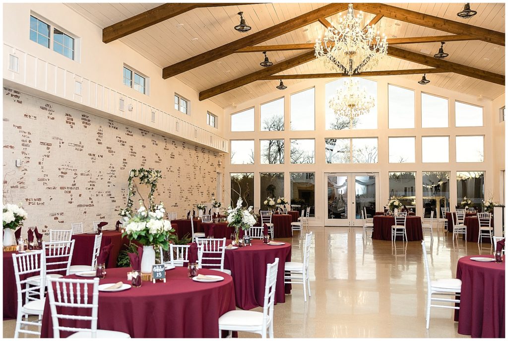 firefly gardens venue midlothian texas white brick wall of windows white shiplap ceiling with exposed wood beams
