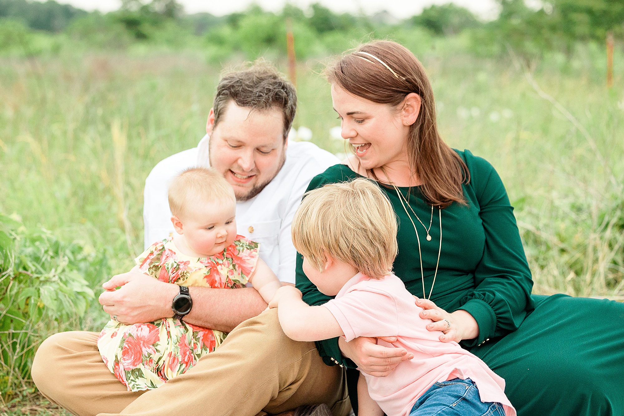 parents play with kids during Little Elm family portraits