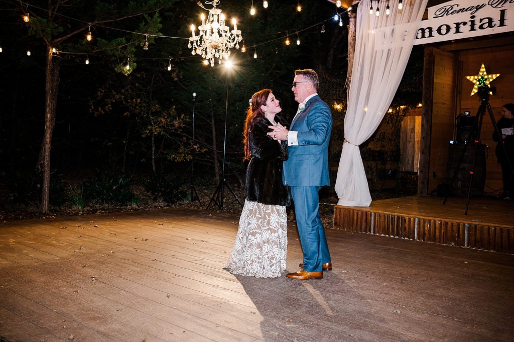 bride dances with brother during Texas wedding reception