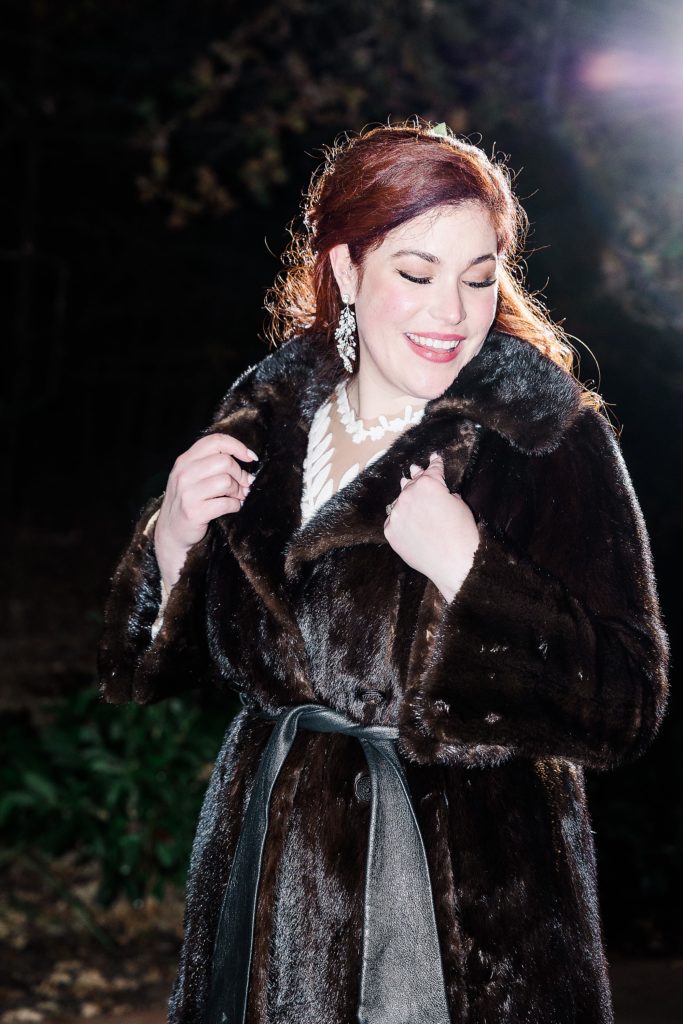 bride wear's grandmother's mink coat during Texas wedding reception