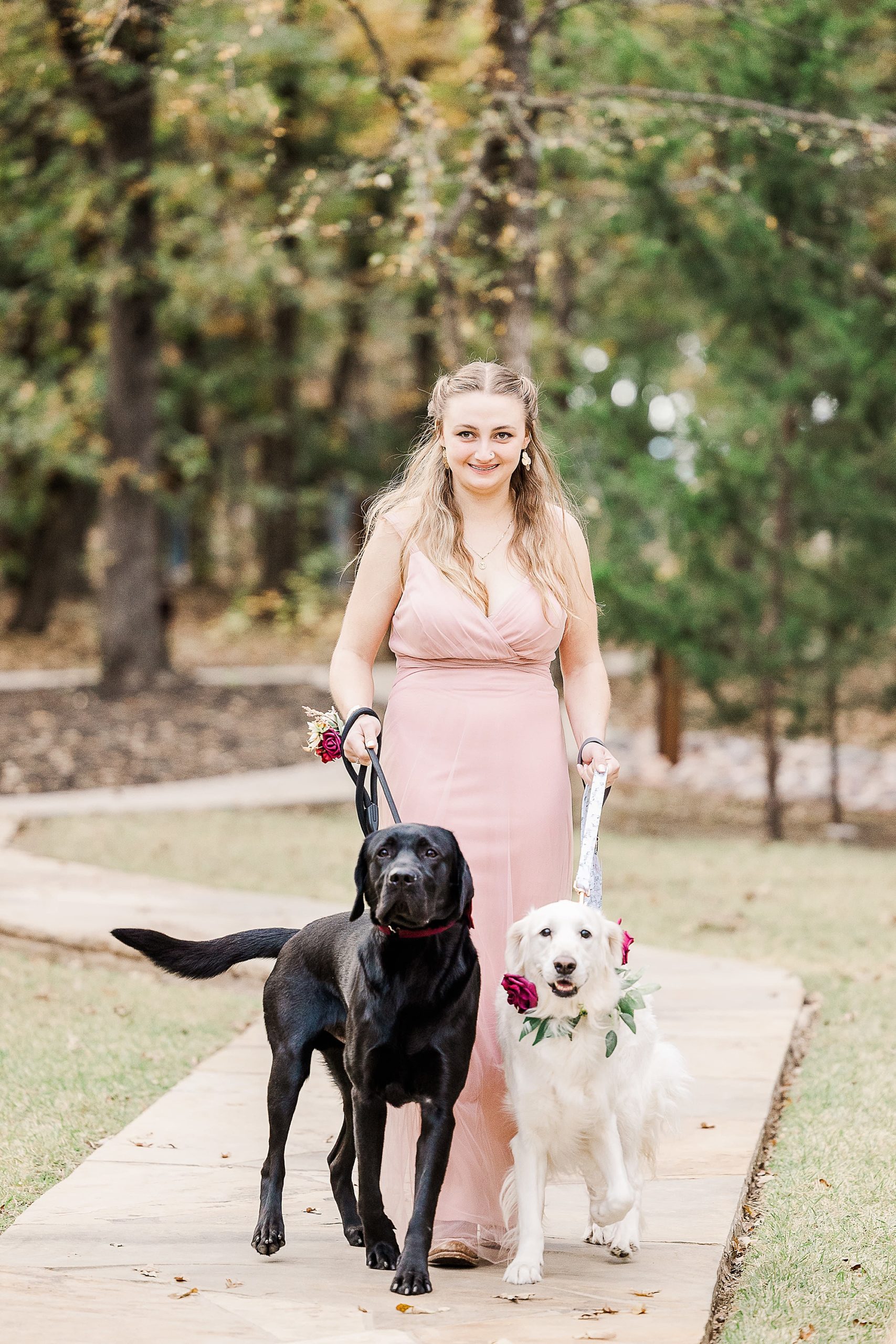 bridesmaid walks dogs down aisle at ceremony in North Texas
