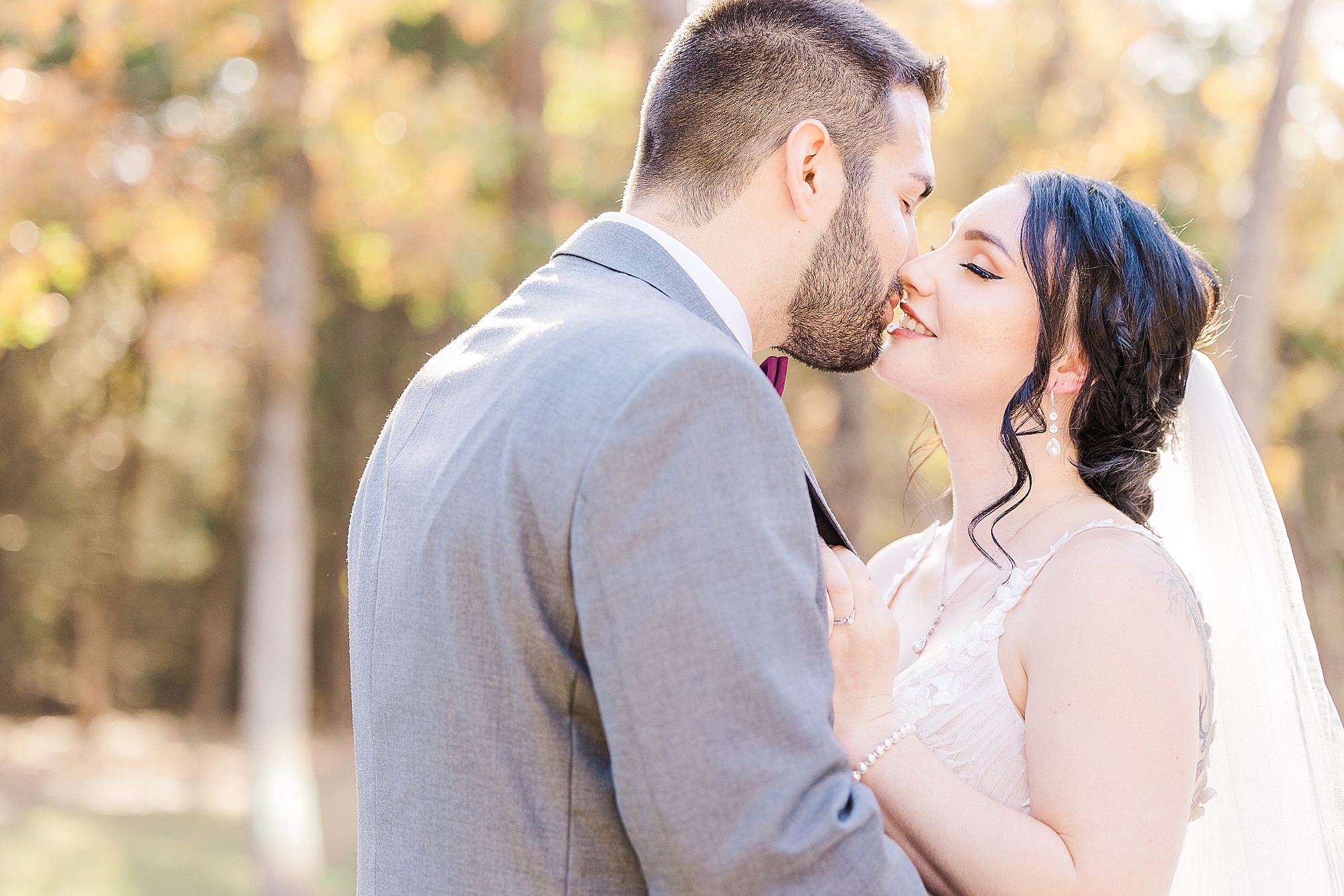 bride and groom almost kiss during TX wedding portraits