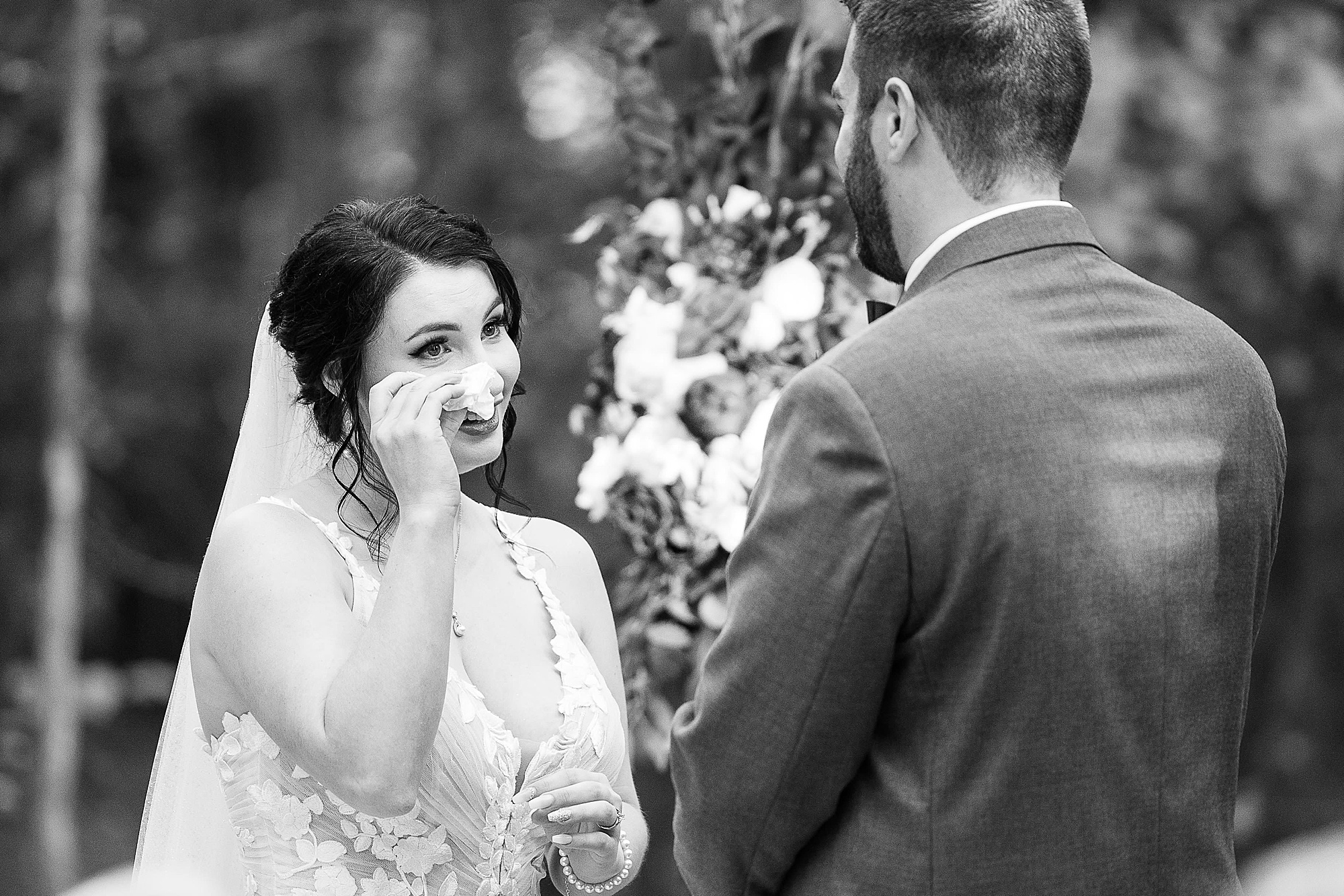 bride cries during outdoor wedding ceremony in North Texas