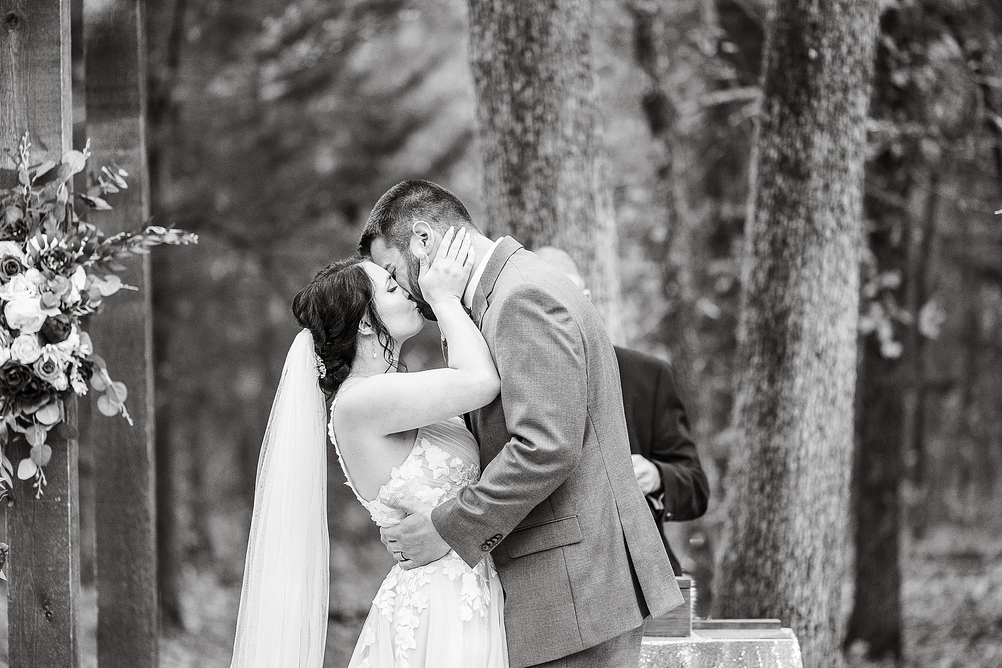 first kiss as husband and wife during outdoor wedding ceremony in North Texas