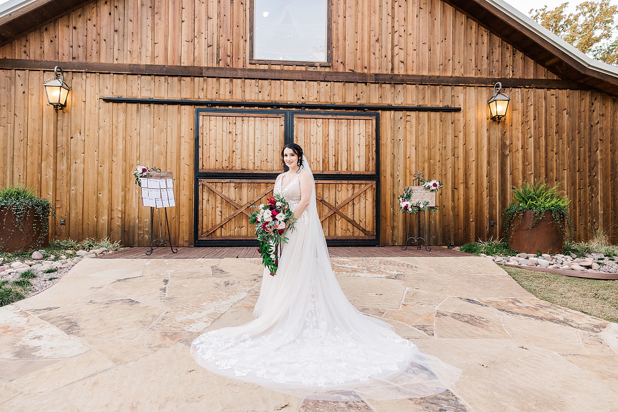 Whispering Oaks bridal portraits for bride in wedding gown with veil over shoulders