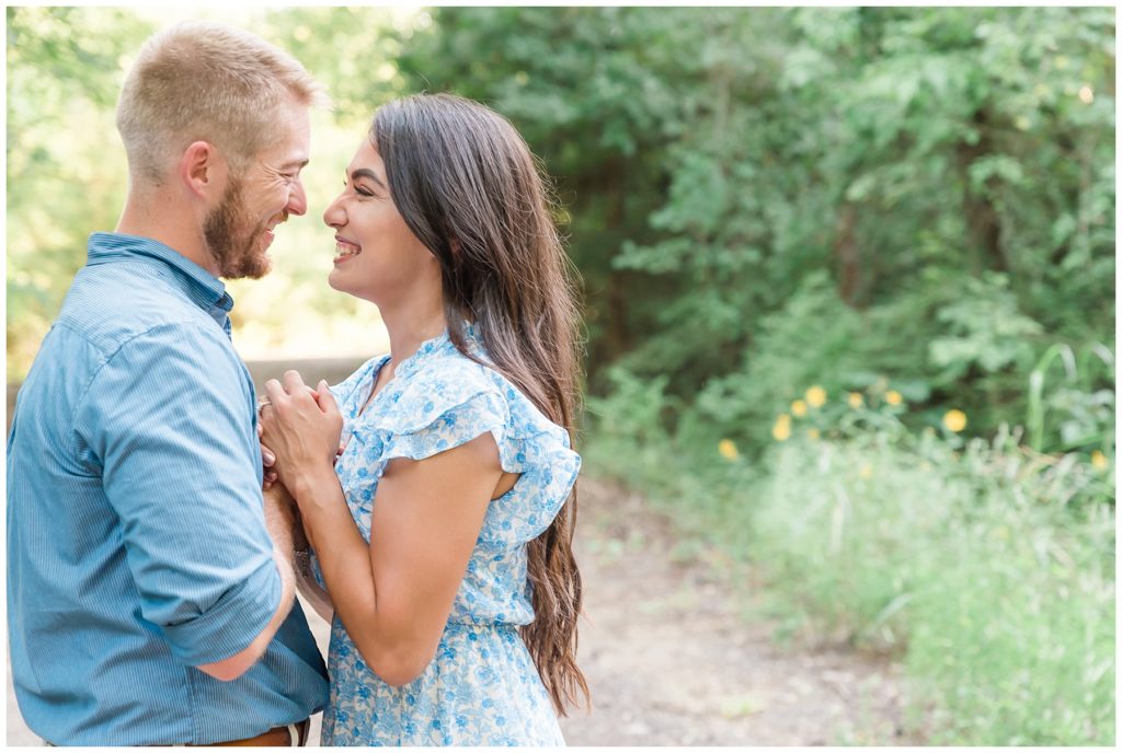engaged couple at clear creek natural heritage center in denton texas engagement session