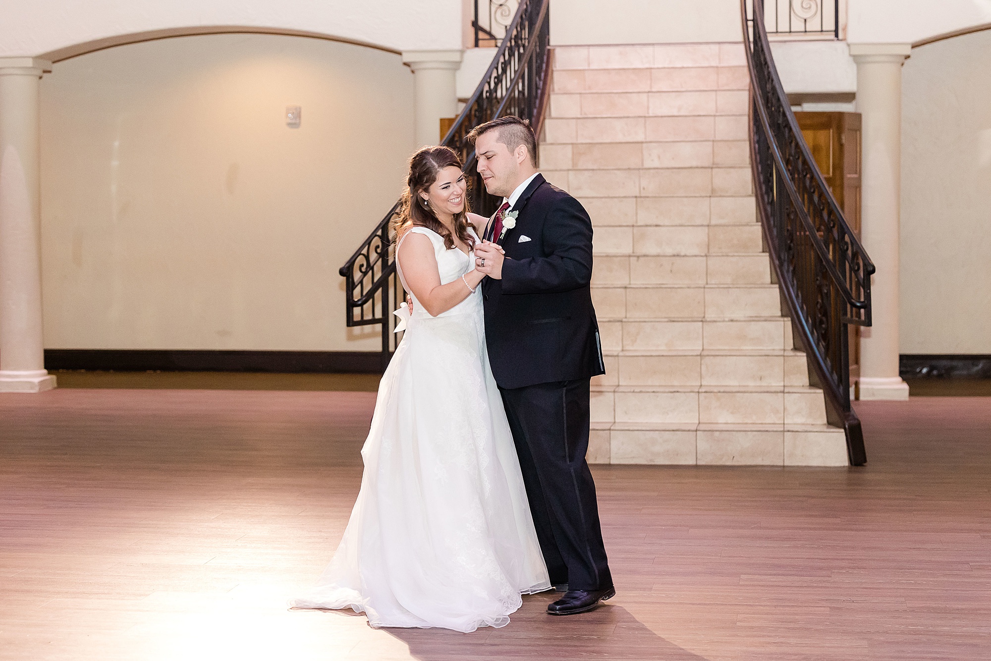 groom dances with bride during Texas wedding reception