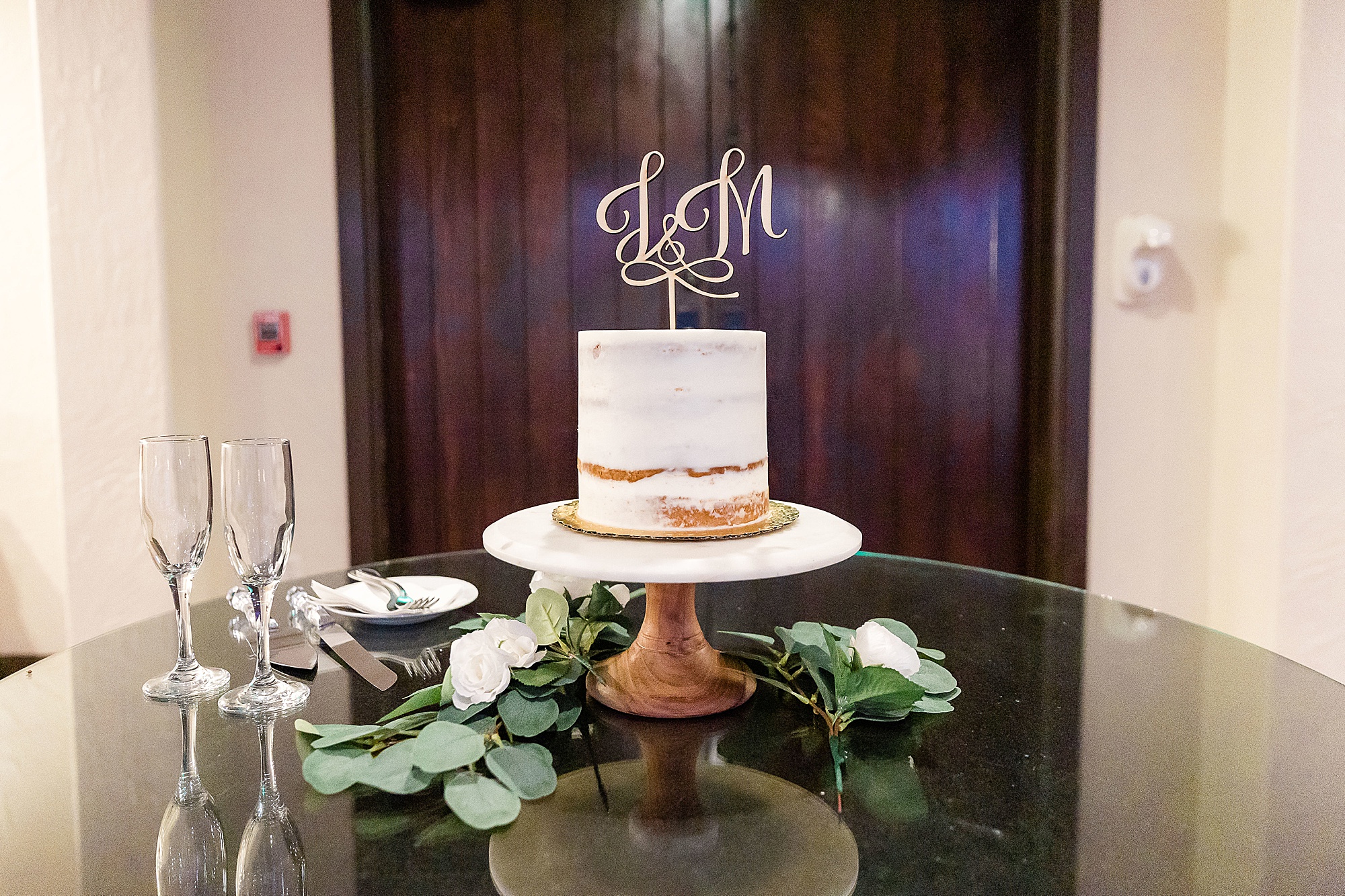 wedding cake on gold charger 