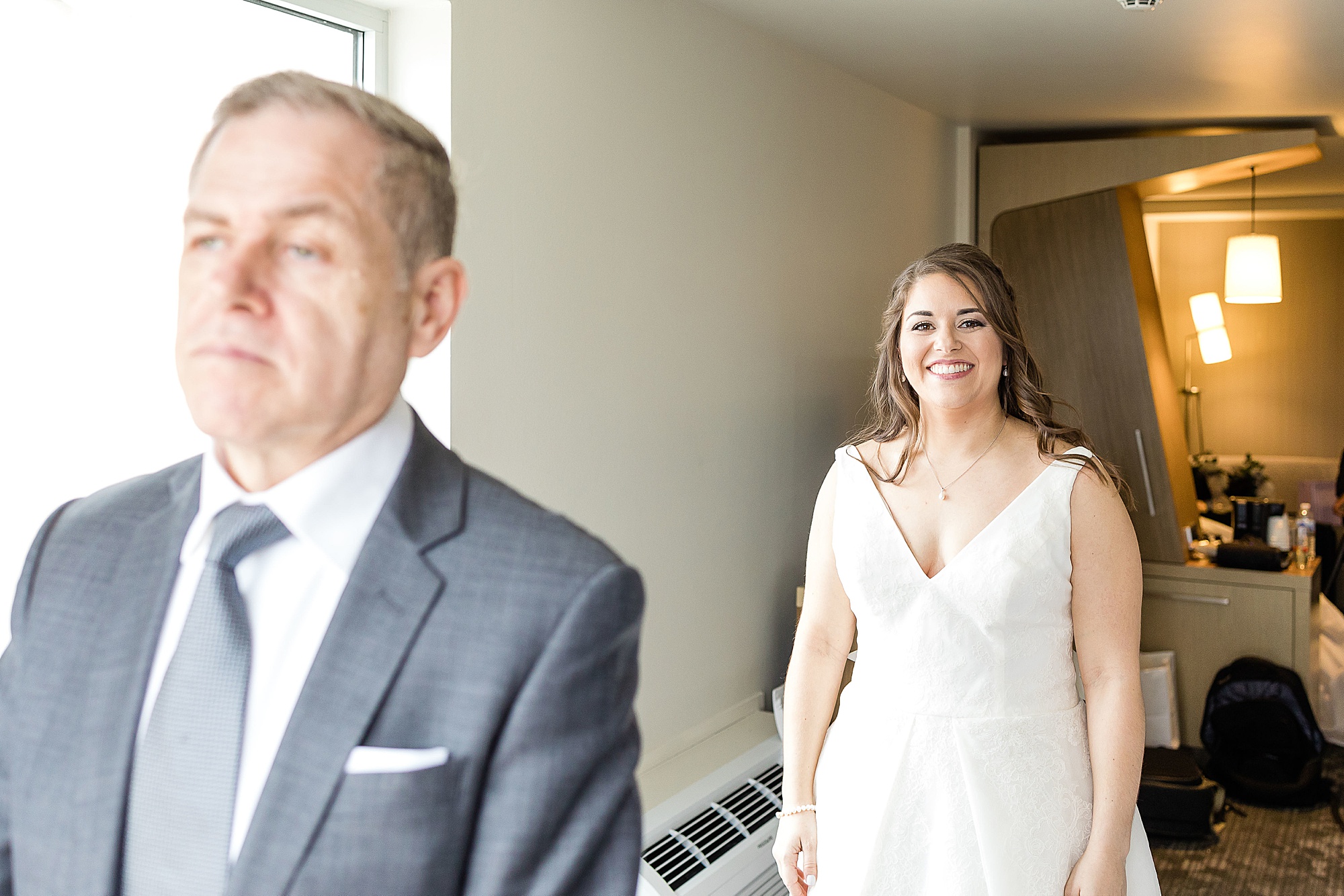 bride approaches dad for first look before TX wedding 