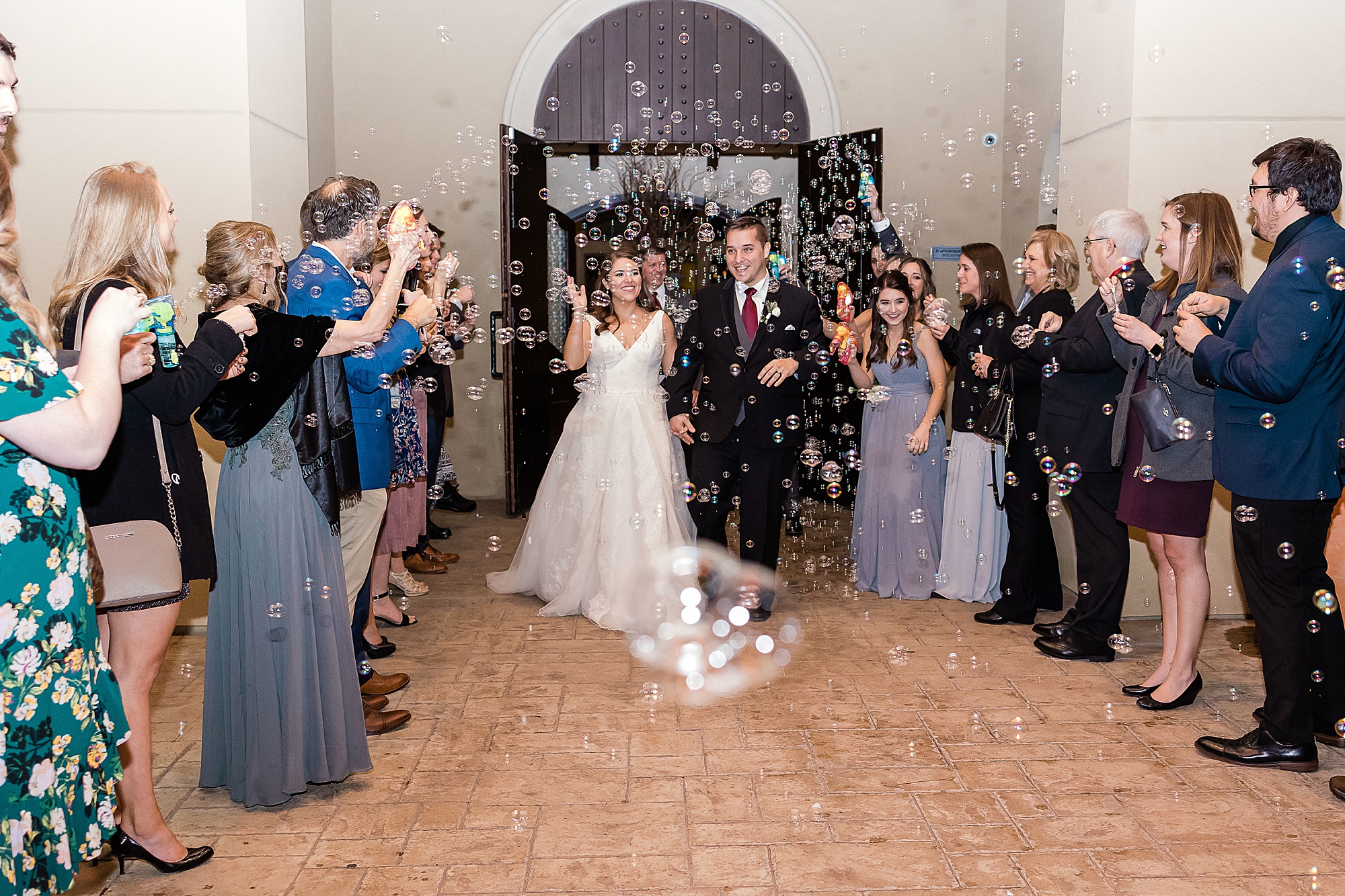 bubble exit from Chapel at Ana Villa wedding 