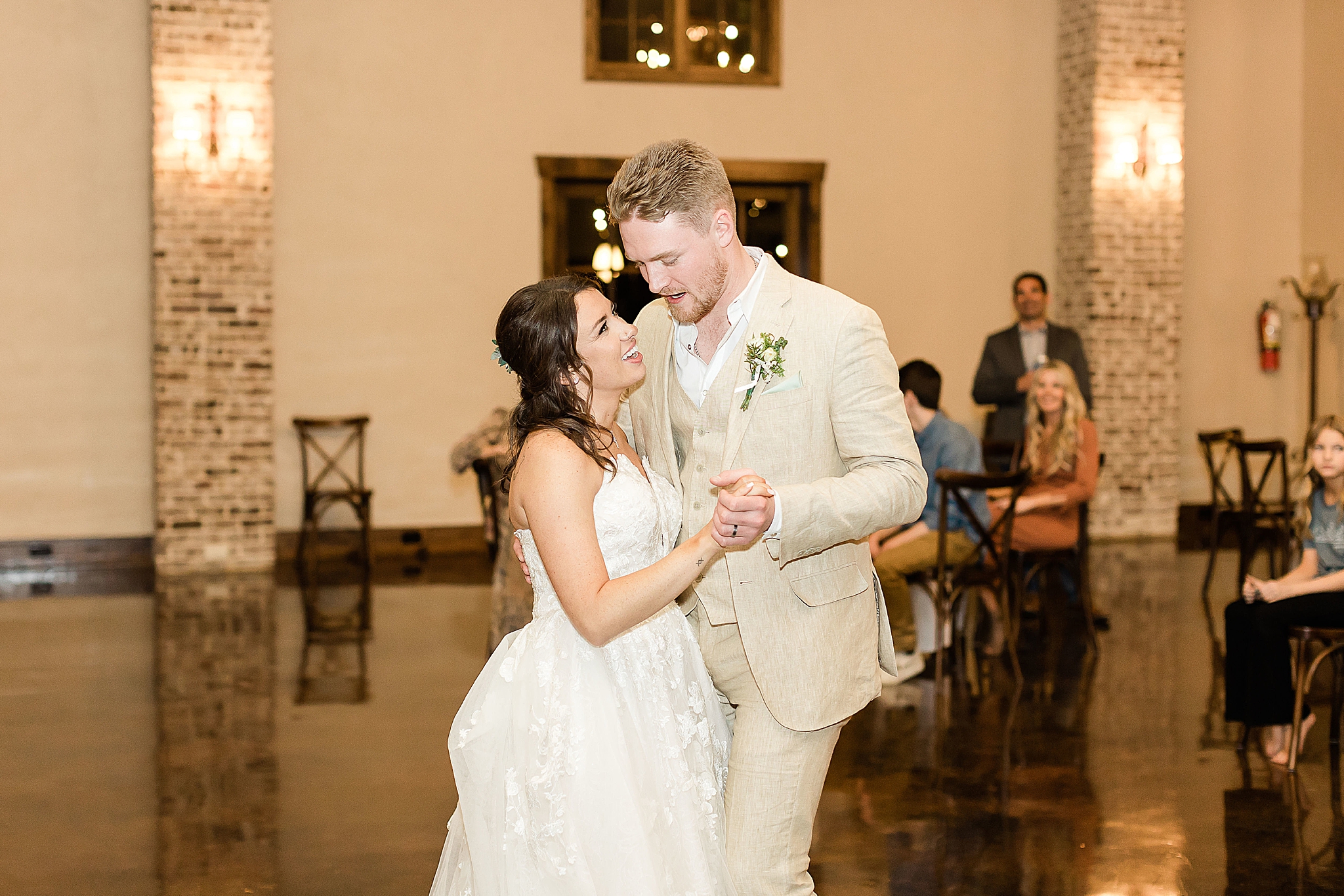 bride and groom dance toegther during Texas wedding reception