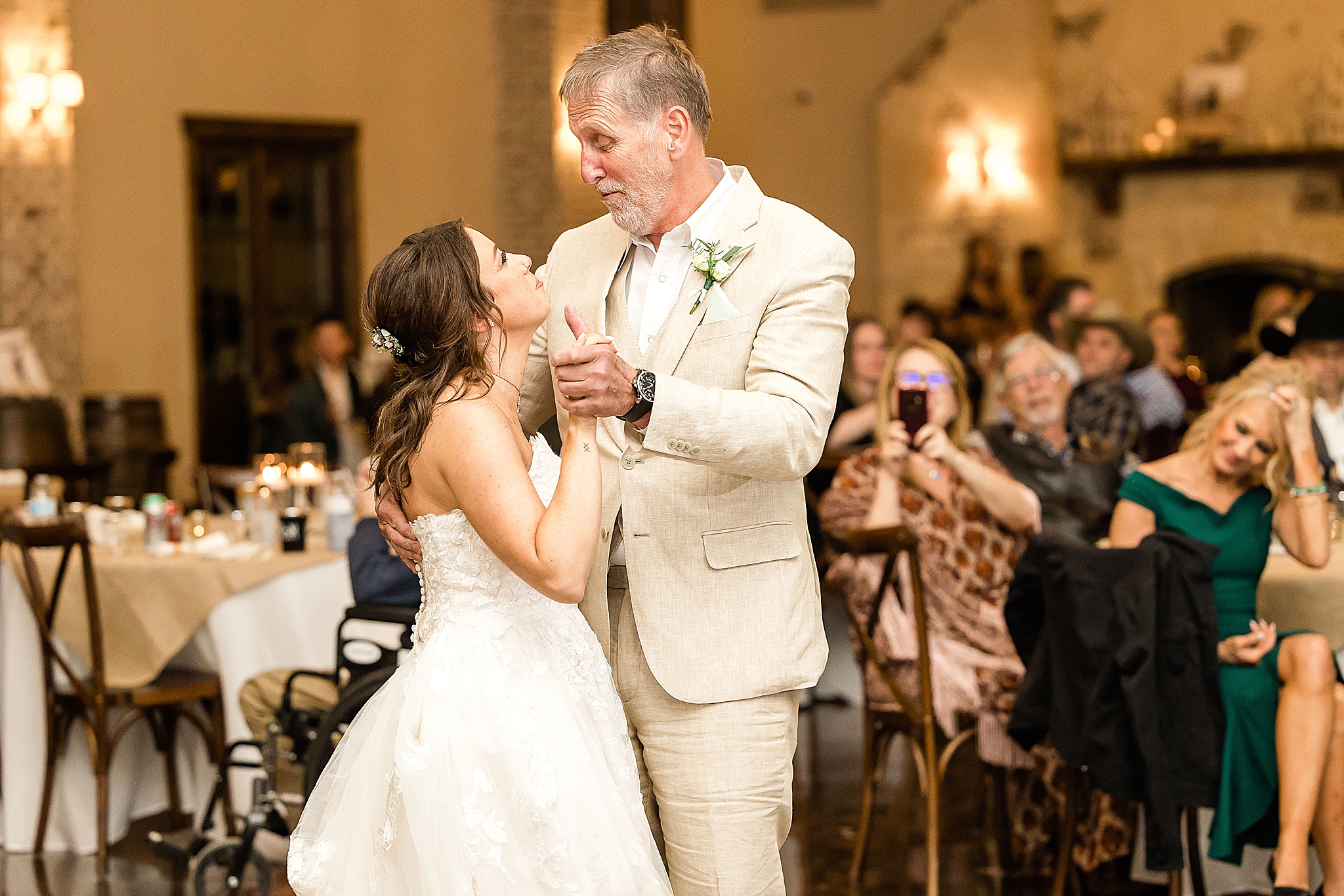 bride and grandfather dance during wedding reception