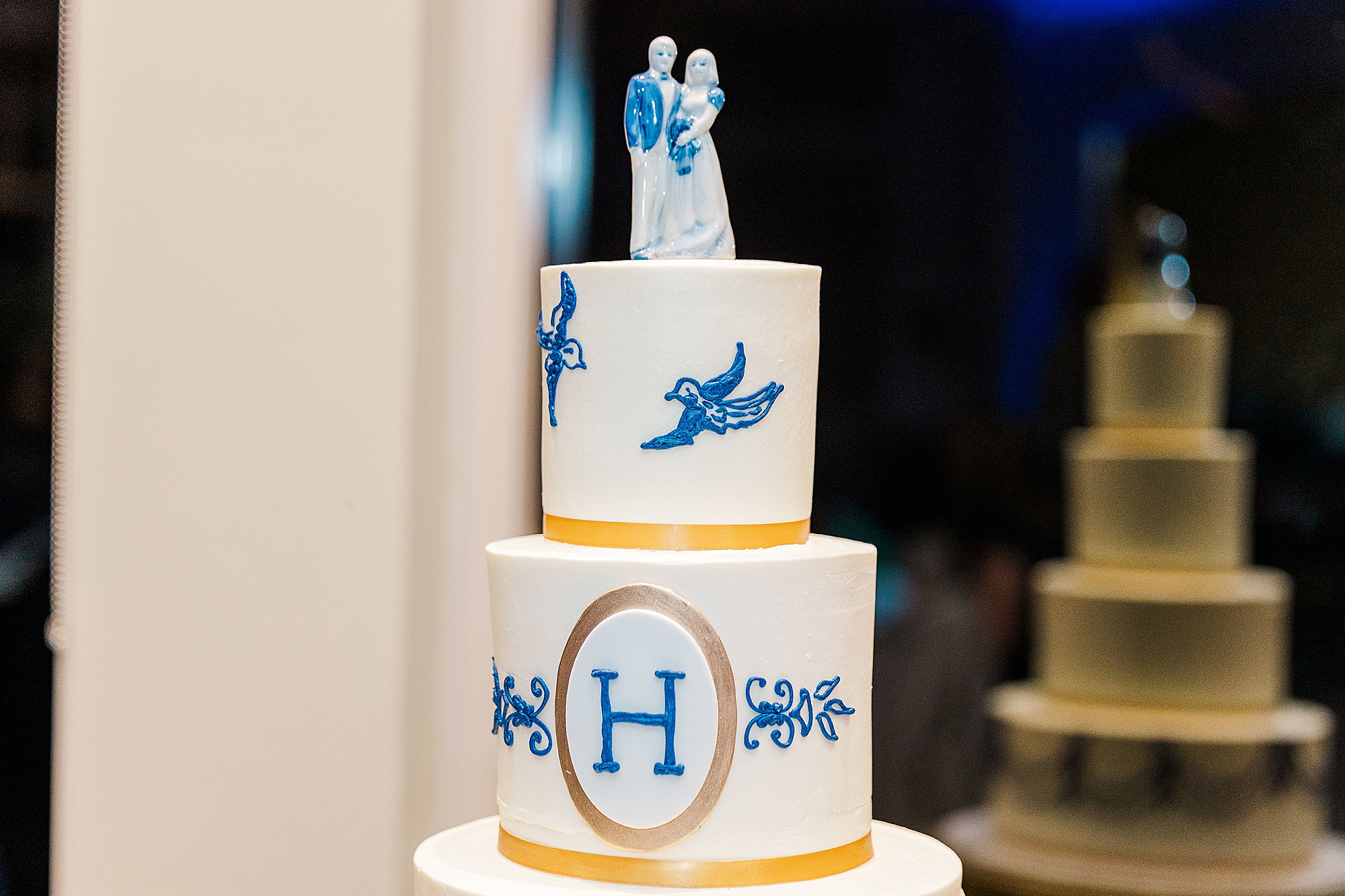wedding cake with blue, white, and gold details for Frisco TX wedding reception