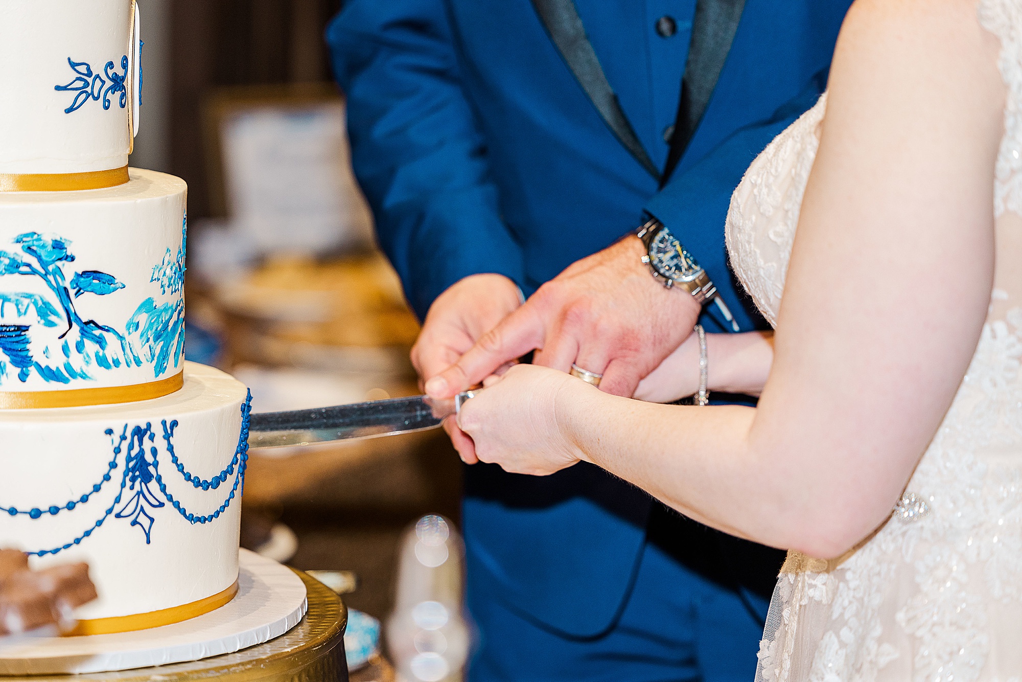 newlyweds cut wedding cake