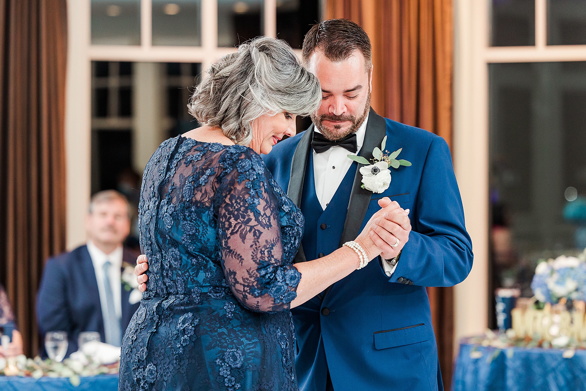 mom and son dance during Frisco TX wedding reception