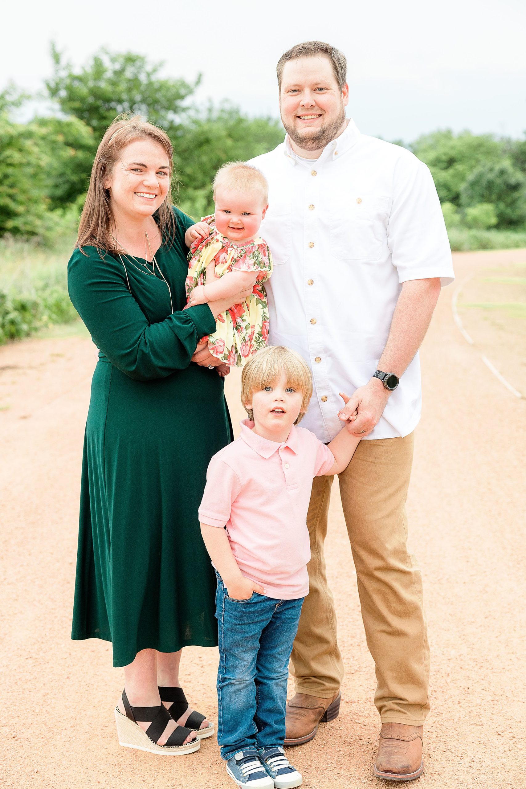 parents pose with two toddlers during Little Elm family portraits