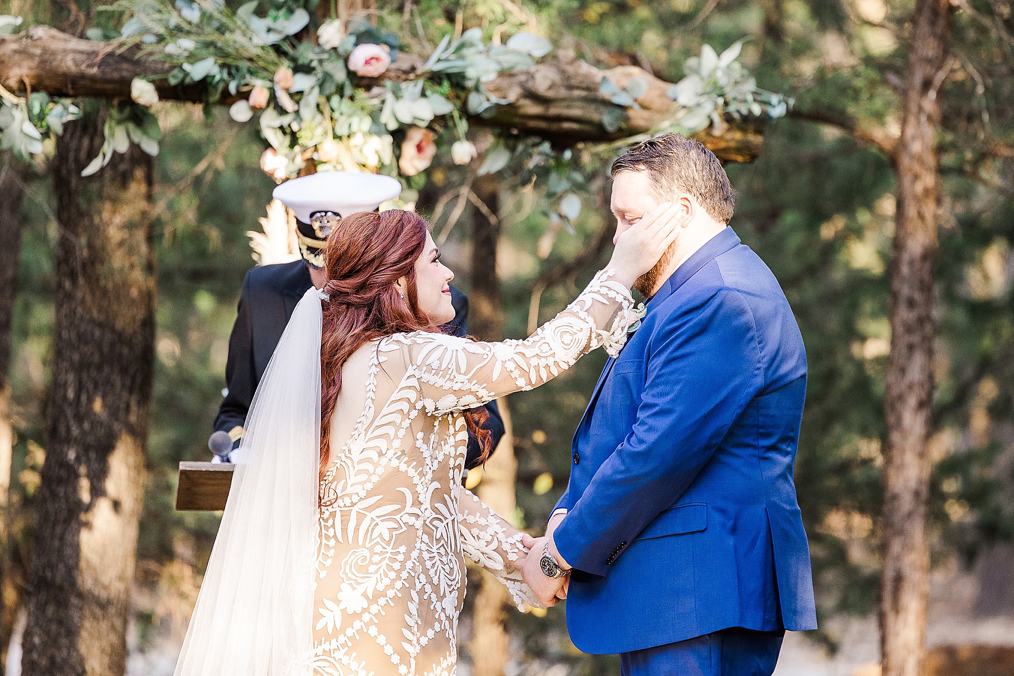 bride walks groom's tears during outdoor wedding ceremony in Texas