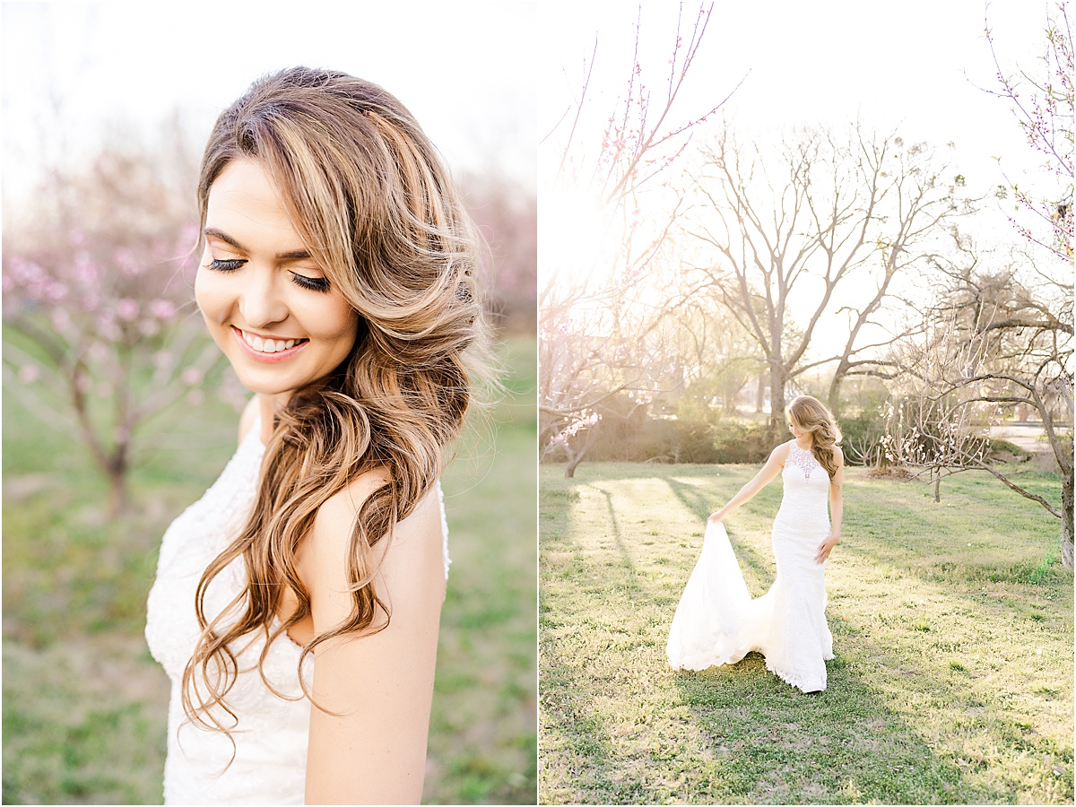bride with sideswept bangs looking down shoulder, bride walking in peach orchard holding train of dress