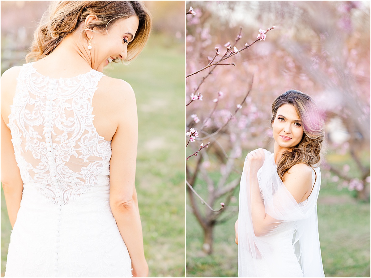 bride with romantic lace back dress with buttons, bride with gown and veil in peach orchard